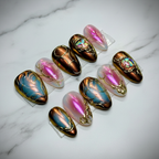 Full set gold chrome aurora scarab press-on nails on white marble studio light custom press-on nails — LuxepressCo