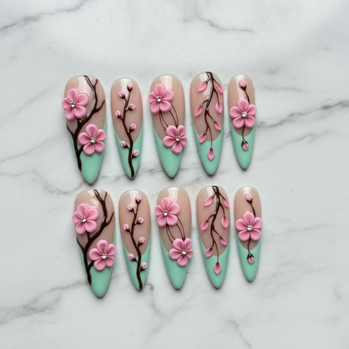 Hero shot full set 10 cherry blossom 3D custom press-on nails white marble background — LuxepressCo