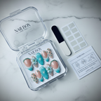 Luxury unboxing acrylic nail box with teal floral press-on nails and accessories — LuxepressCo