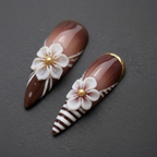 Macro close-up 3D white porcelain flower gold foil swirl custom press-on nails brown ombre — LuxepressCo