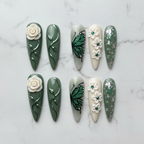 Sage green 3D floral butterfly press-on nails full set flat lay top-down studio — LuxepressCo
