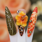 Macro close-up 3D yellow hibiscus leopard print olive feather leaf gold chain salon-quality press-on nails orange — LuxepressCo