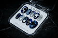 Midnight galaxy navy blue cat-eye star coquette bow custom press-on nails full set on marble — LuxepressCo