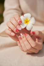 Red Floral Press-On Nails lifestyle light skin