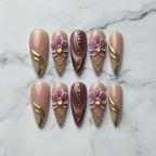 Flat lay top-down full set 10 salon-quality press-on nails orchid gold foil nude blush — LuxepressCo