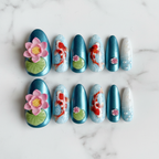 Flat lay top-down full set 10 koi lotus salon-quality custom press-on nails white marble — LuxepressCo