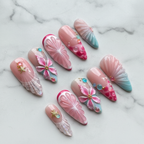 Mermaid shell 3D tropical flower jelly bubble press-on nails hero shot white marble studio custom press-on nails — LuxepressCo