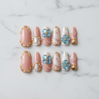 Flat lay top-down full set 10 luxury pearl marble baroque 3D flower custom press-on nails white marble — LuxepressCo