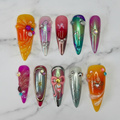 Y2K fantasy stiletto iridescent chrome bow star rhinestone custom press-on nails full set on marble — LuxepressCo