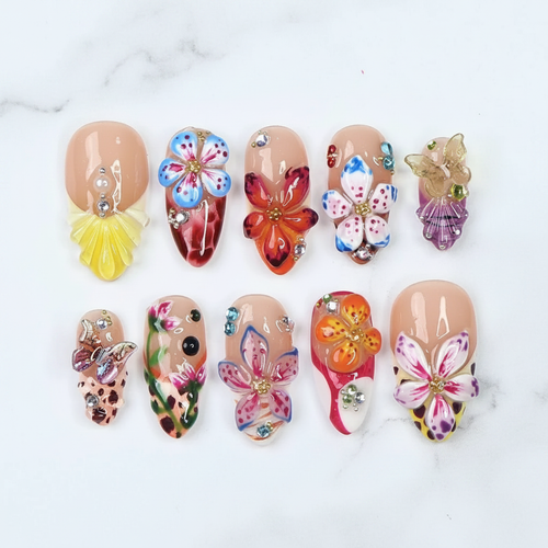 Colorful floral garden 3D flower butterfly custom press-on nails vibrant resin charms full set flat lay — LuxepressCo