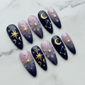 Full set 10 celestial press-on nails navy blue lavender marble background studio hero shot — LuxepressCo