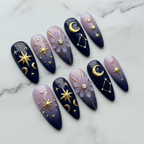 Full set 10 celestial press-on nails navy blue lavender marble background studio hero shot — LuxepressCo