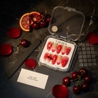 Luxury unboxing acrylic nail box dark cherry blood orange press-on nails with dark cherries blood orange rose petals moody props — LuxepressCo
