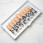 Nude peach black botanical swirl feather art custom press-on nails long square full set on marble — LuxepressCo