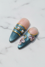 Close-up gold geometric pearl blue rhinestone salon-quality press-on nails teal nude — LuxepressCo