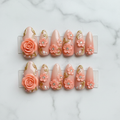 Flat lay top-down full set 10 3D peach rose gold filigree salon-quality nails white marble — LuxepressCo