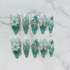 Flat lay top-down full set 10 mint green 3D butterfly flower custom press-on nails — LuxepressCo