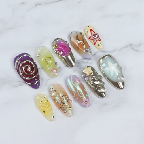 Aurora fantasy almond mermaid star gold spiral jelly custom press-on nails full set on marble — LuxepressCo