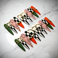 Checkerboard abstract face art gold charm stiletto custom press-on nails green orange full set on marble — LuxepressCo