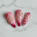Macro close-up blush rose gradient marble swirl 3D floral pearl custom press-on nails almond stiletto — LuxepressCo