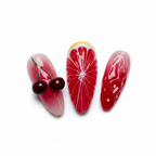 Macro close-up blood orange citrus starburst 3D dark red cherry pair deep red gradient jelly white dot nail art — LuxepressCo