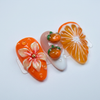 Macro close-up 3D white flower orange fruit citrus slice iridescent shimmer nail art — LuxepressCo