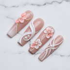 Macro close-up white marble swirl and 3D crosshatch ribbon pearl custom press-on nails glossy texture — LuxepressCo