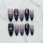 Flat lay top-down full set 10 celestial galaxy press-on nails white marble studio — LuxepressCo