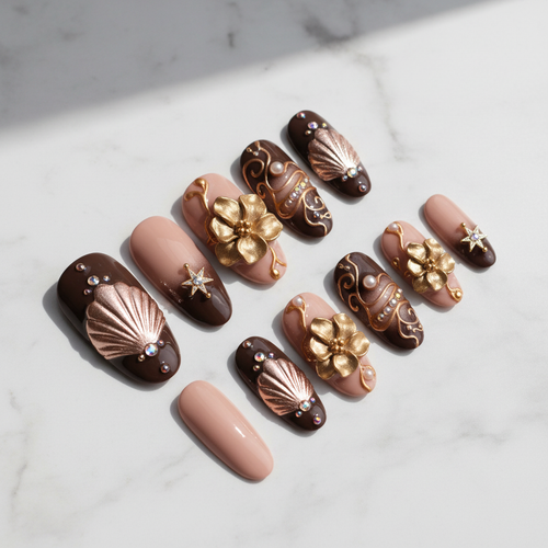 Chocolate brown rose gold chrome fan shell 3D magnolia custom press-on nails gold vine star charm full set flat lay — LuxepressCo