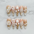 Flat lay top-down full set 10 white floral gold rhinestone pearl custom press-on nails — LuxepressCo