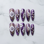 Flat lay top-down full set 10 purple chrome 3D floral press-on nails marble background studio light custom press-on nails — LuxepressCo