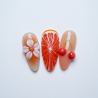 Macro close-up blood orange citrus starburst 3D white flower gold bead 3D red cherry pair orange gradient nail art — LuxepressCo