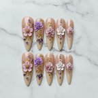 Flat lay top-down full set 10 3D floral orchid crystal stiletto custom press-on nails white marble — LuxepressCo
