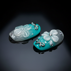 Macro close-up teal 3D floral chrome bow rhinestone salon-quality nails nail art detail — LuxepressCo