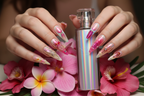 Lifestyle light skin hands wearing aurora mermaid holographic custom press-on nails holding pink flowers — LuxepressCo