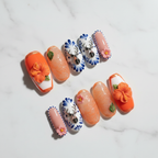 3D hibiscus Talavera folk art custom press-on nails orange French tip navy blue botanical flat lay — LuxepressCo