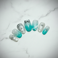Full set teal floral bow press-on nails on white marble studio light custom press-on nails — LuxepressCo
