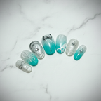 Full set teal floral bow press-on nails on white marble studio light custom press-on nails — LuxepressCo