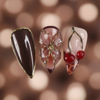 Macro close-up 3D gold flower charm cherry motif leopard print stiletto salon-quality press-on nails — LuxepressCo