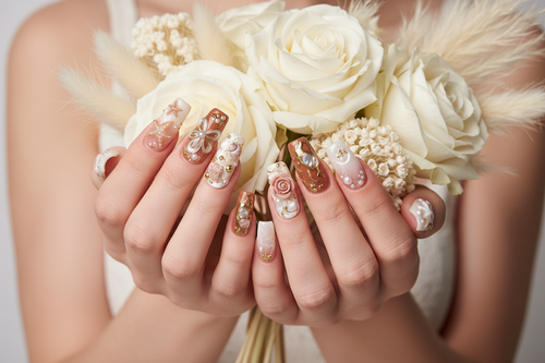 Light skin hands holding white roses pampas grass wearing ocean pearl custom press-on nails terracotta blush — LuxepressCo