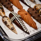Macro close-up rhinestone crystal cross 3D sculpted bow gothic stiletto custom press-on nails — LuxepressCo