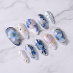 Blue aurora floral 3D almond press-on nails full set on marble studio light custom press-on nails — LuxepressCo