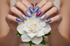 Light skin hands holding gardenia wearing cobalt blue chrome reusable nails salon-quality — LuxepressCo