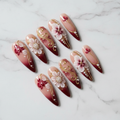 Full set 10 burgundy 3D floral pearl gold filigree custom press-on nails on marble background — LuxepressCo