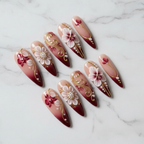 Full set 10 burgundy 3D floral pearl gold filigree custom press-on nails on marble background — LuxepressCo