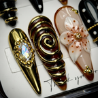 Macro close-up 3D gold spiral porcelain flower AB crystal gem custom press-on nails — LuxepressCo