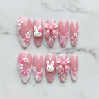 3D bunny bow floral coquette pink press-on nails hero shot white marble studio custom press-on nails — LuxepressCo