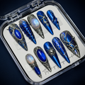 Royal blue chrome gothic wing sapphire cabochon custom press-on nails full set on dark navy — LuxepressCo