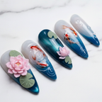 Close-up teal chrome cat-eye koi fish reusable press-on nails pearl bubble detail almond shape — LuxepressCo