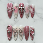 Flat lay top-down full set 10 gothic rose press-on nails arranged on white marble custom press-on nails — LuxepressCo